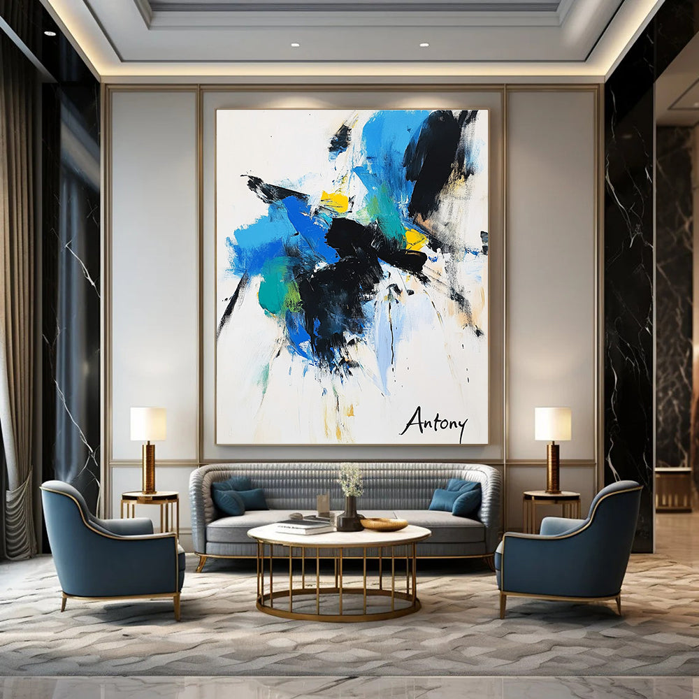 Abstract painting features bold black brush strokes with blue green and yellow accents on a white background with Antony elegantly displayed in large letters.STSC039