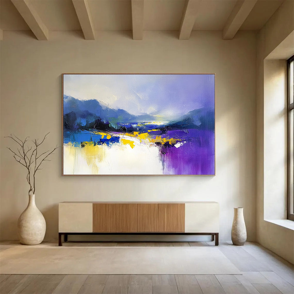 Large abstract painting featuring soft purple and blue hues with yellow accents created using loose brush strokes for a calming effect.SC317