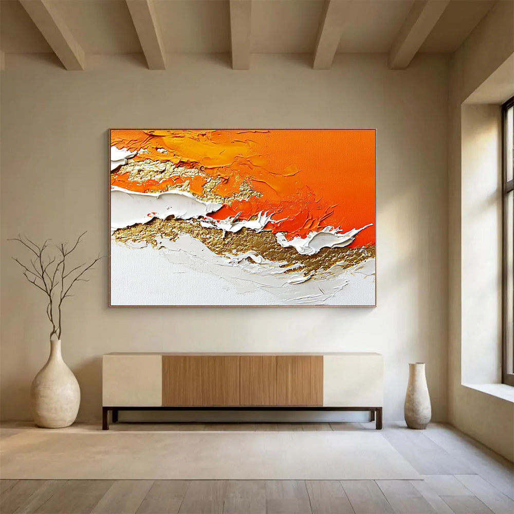 A large abstract painting with layers of orange and white enhanced by gold details and rich texture.SC325