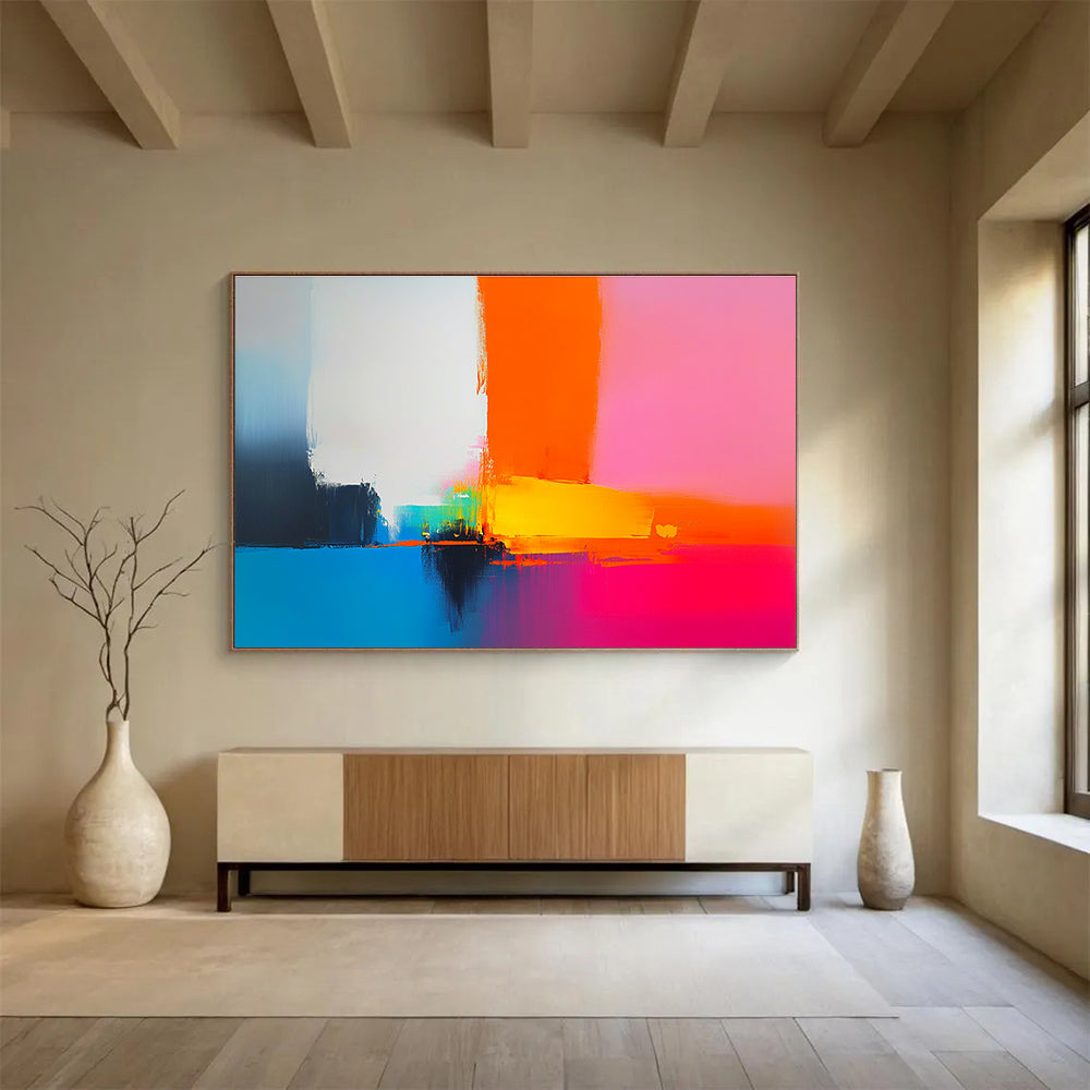 A large abstract painting featuring bold shapes and clean lines in pink orange blue yellow and white inspired by Peter Wileman's brushstrokes.SC505
