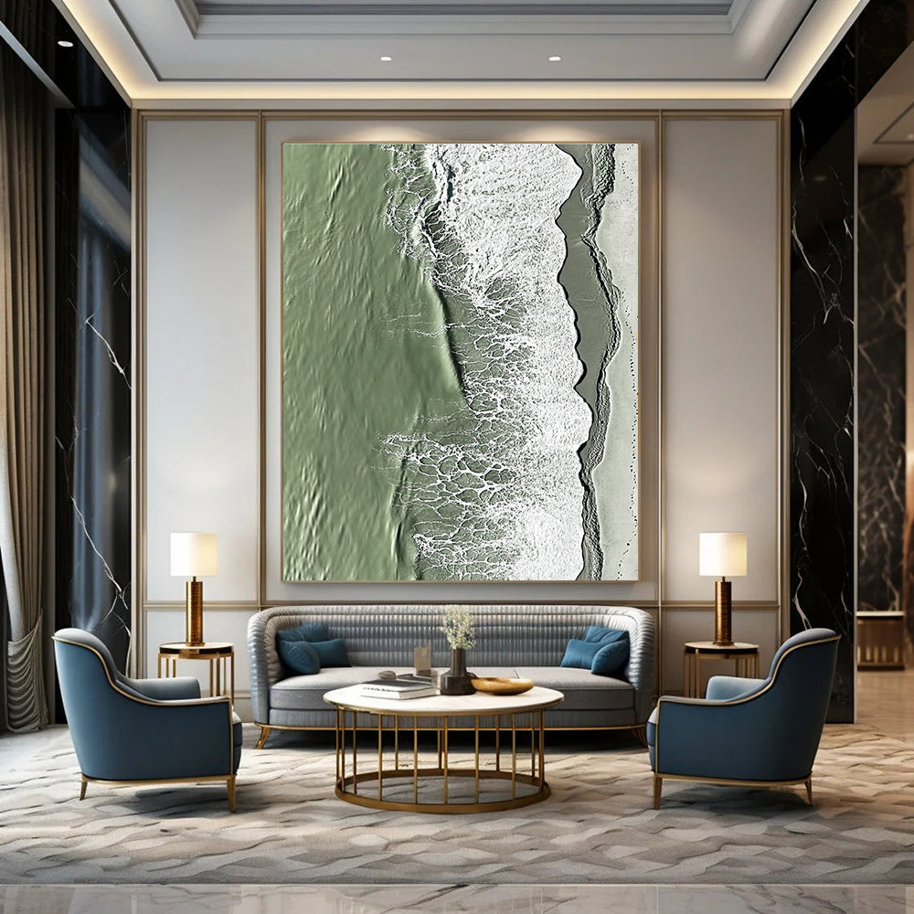 A large abstract painting capturing the serene edge where sand meets water in green and grey tones with rolling waves.STSC1158