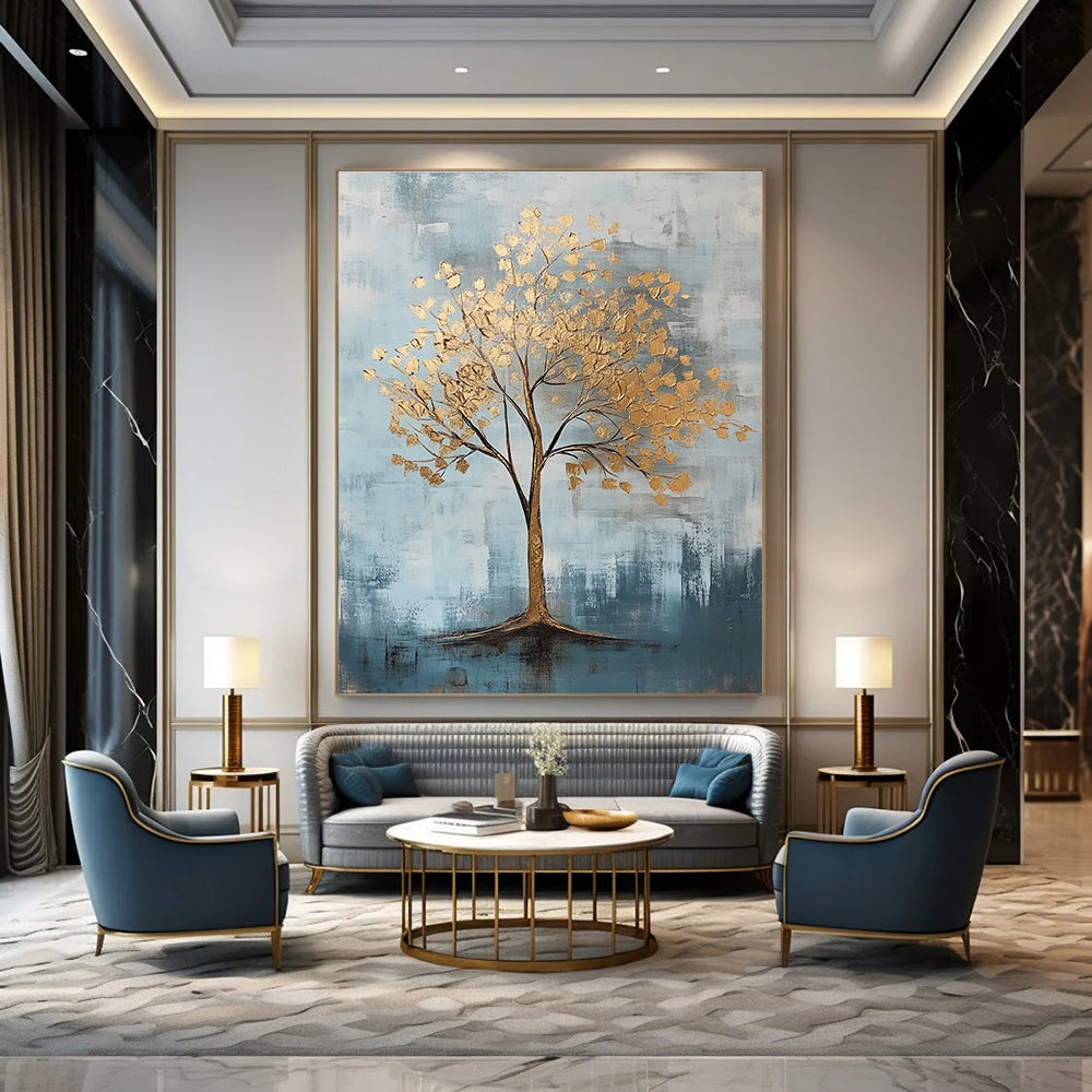 Abstract artwork featuring gold leaf accents against a cool gray and light blue backdrop with textured brush strokes.STSC838