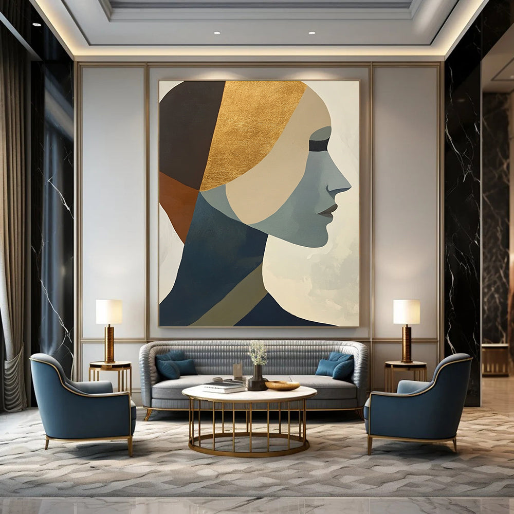 Large abstract painting featuring cubist shapes and lines muted colors gold foil accents and a hint of the female form.STSC692