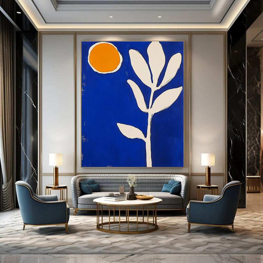 Large abstract painting featuring blue and white shapes an orange sun and a thick brush stroke flower in vibrant colors.STSC1316