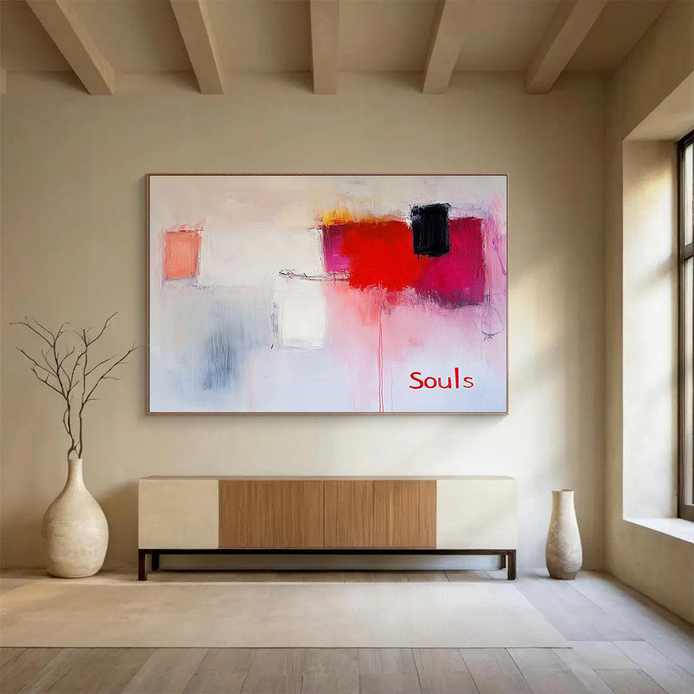 Large abstract painting in soft pinks and whites with red hints features expressive brushstrokes and the word Souls in a minimalist style.SC139