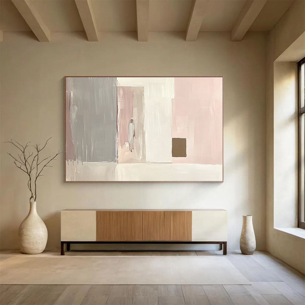 Large abstract painting in light pink and white with gray and a small brown square emphasizes minimalist brushstrokes and elegant simplicity in oil paint.SC223