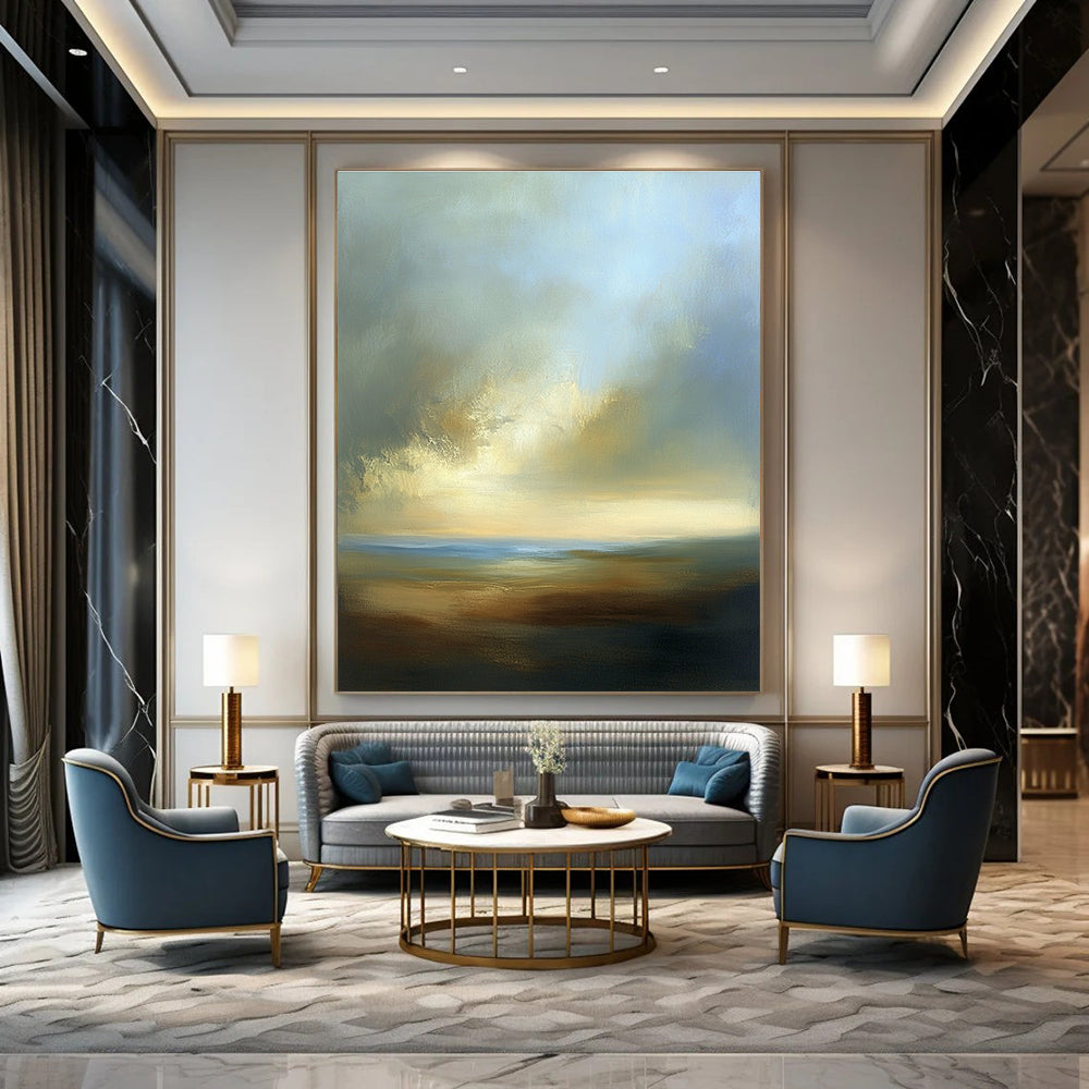 Large abstract painting depicting a dreamy sky with soft blues browns whites and beige clouds over a serene horizon at sea level.STSC886