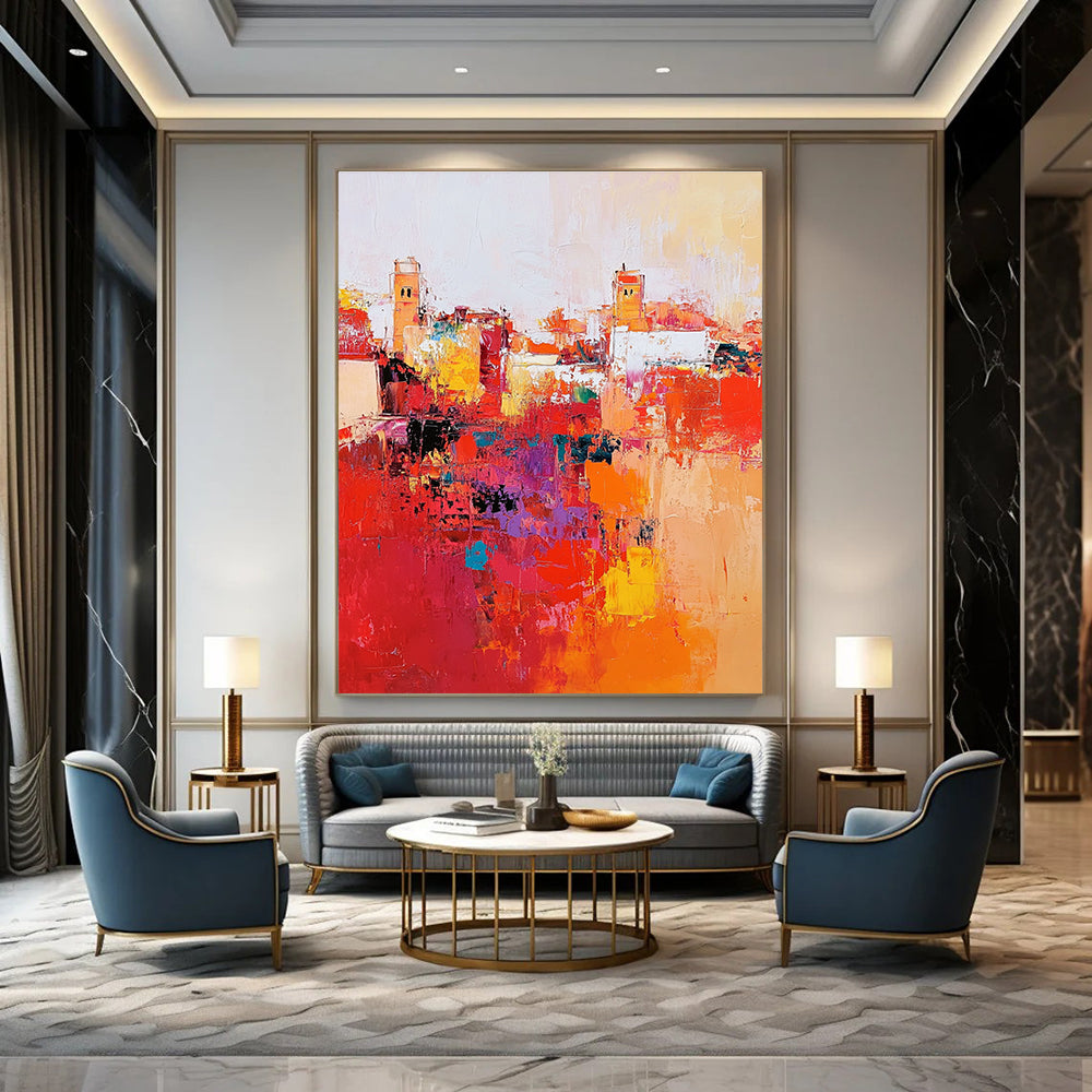 Large abstract painting depicting Marrakech cityscape with vibrant reds and oranges thick brush strokes and dynamic composition creating atmospheric lighting.STSC556