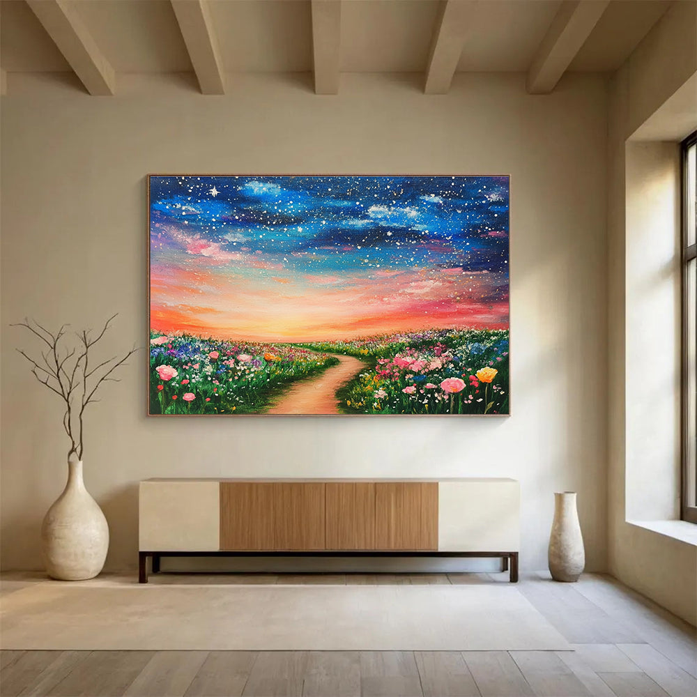 A large abstract painting of a dreamy field adorned with colorful flowers under a starry sky and a pink sunset, evoking a magical atmosphere.SC397