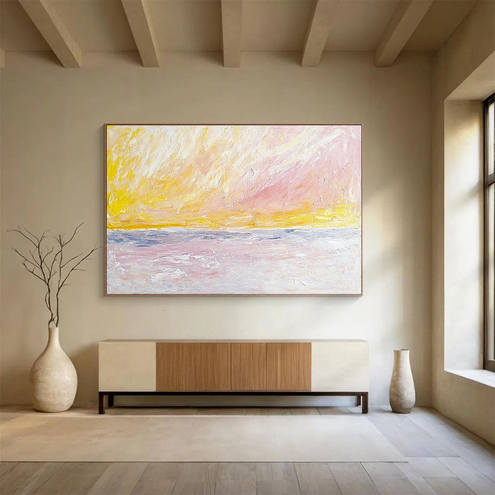 Large abstract painting of sky and sea in Turner style featuring pale pink yellow and beige colors with bold brush strokes.SC365