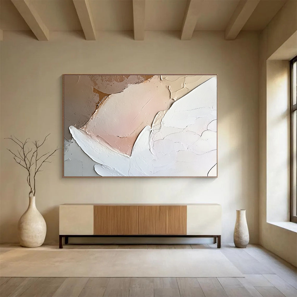 Large abstract painting of an angel featuring neutral colors and soft pink and white tones with heavy brush strokes on canvas.SC152
