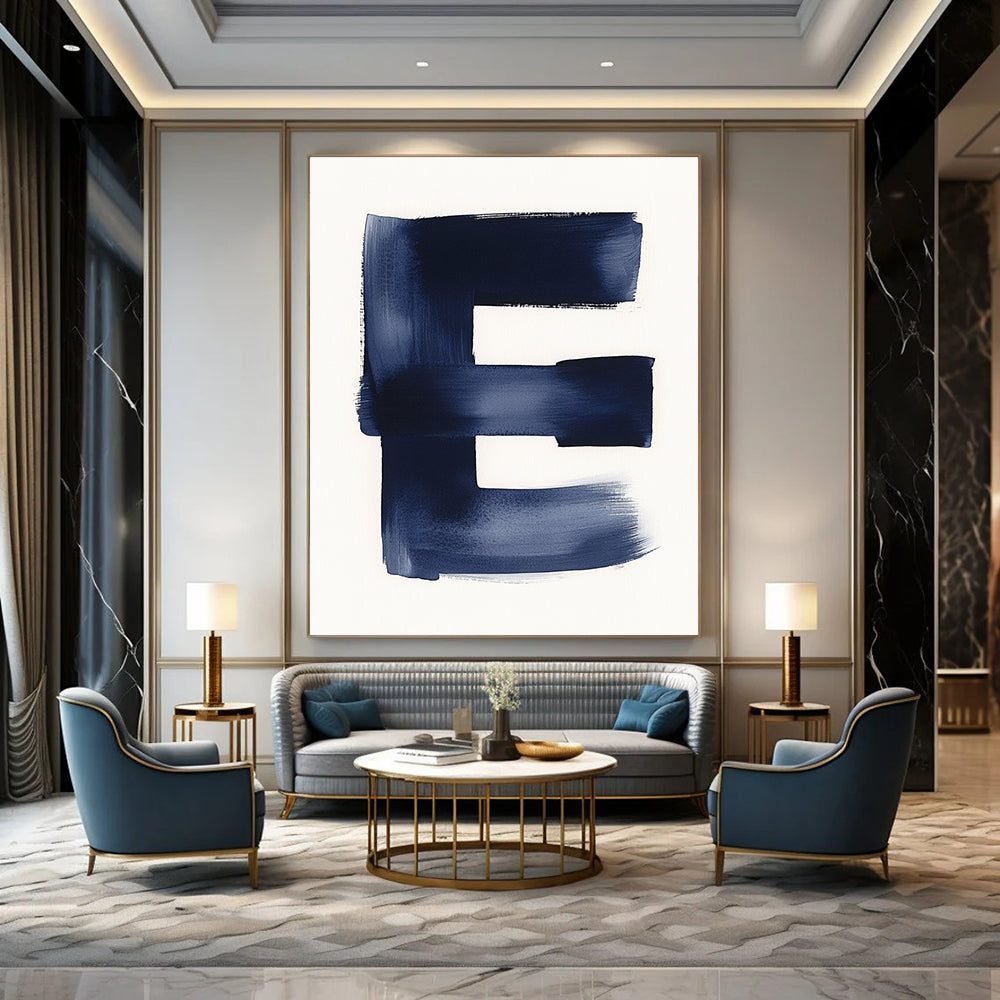 A large abstract painting featuring a minimalist watercolor letter E in navy blue against a white background emphasizing negative space and soft tones.STSC1096