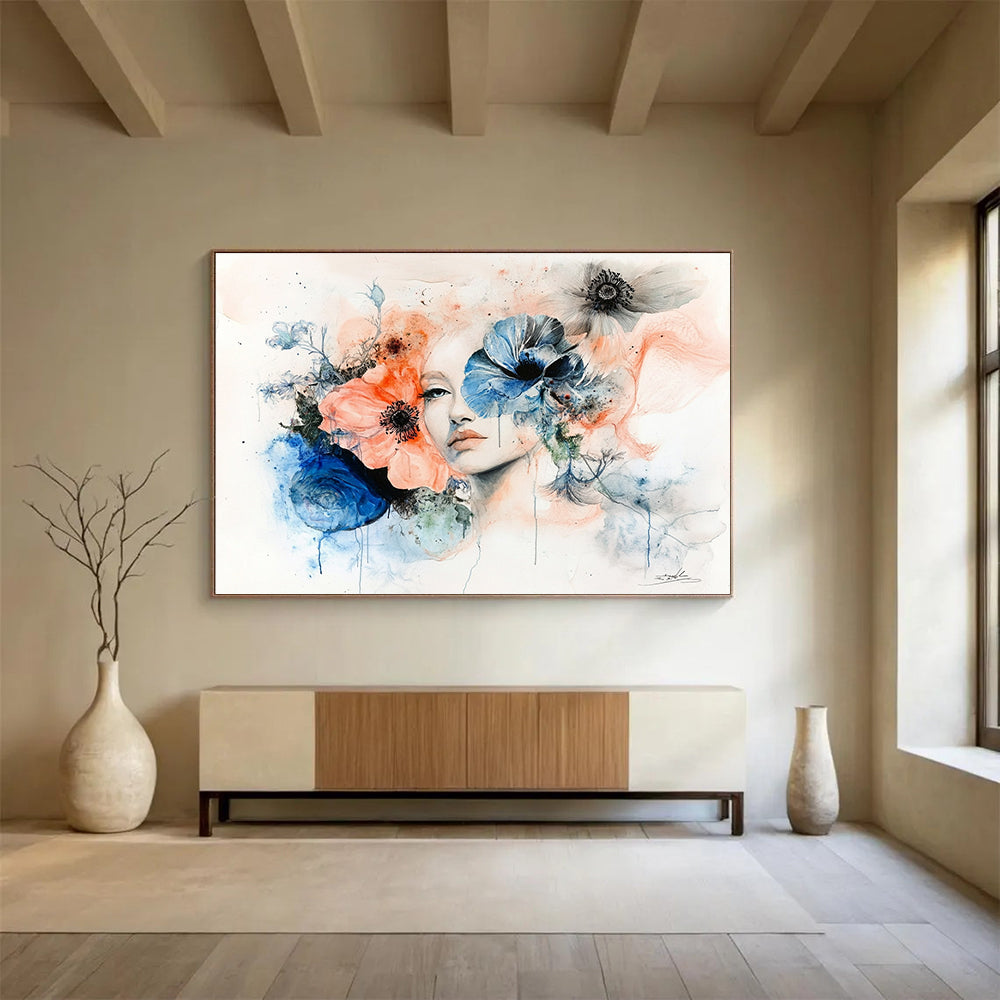 Large abstract painting featuring a woman's face framed by flowers in muted pastels of peach pink blue and grey on a white background.SC566