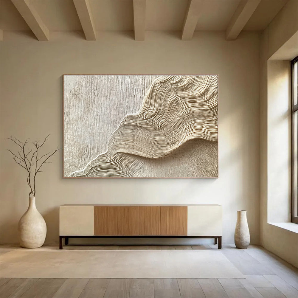 Large abstract painting featuring layered waves and curves in light beige tones resembling water ripples on sand dunes with fine brushwork.SC613