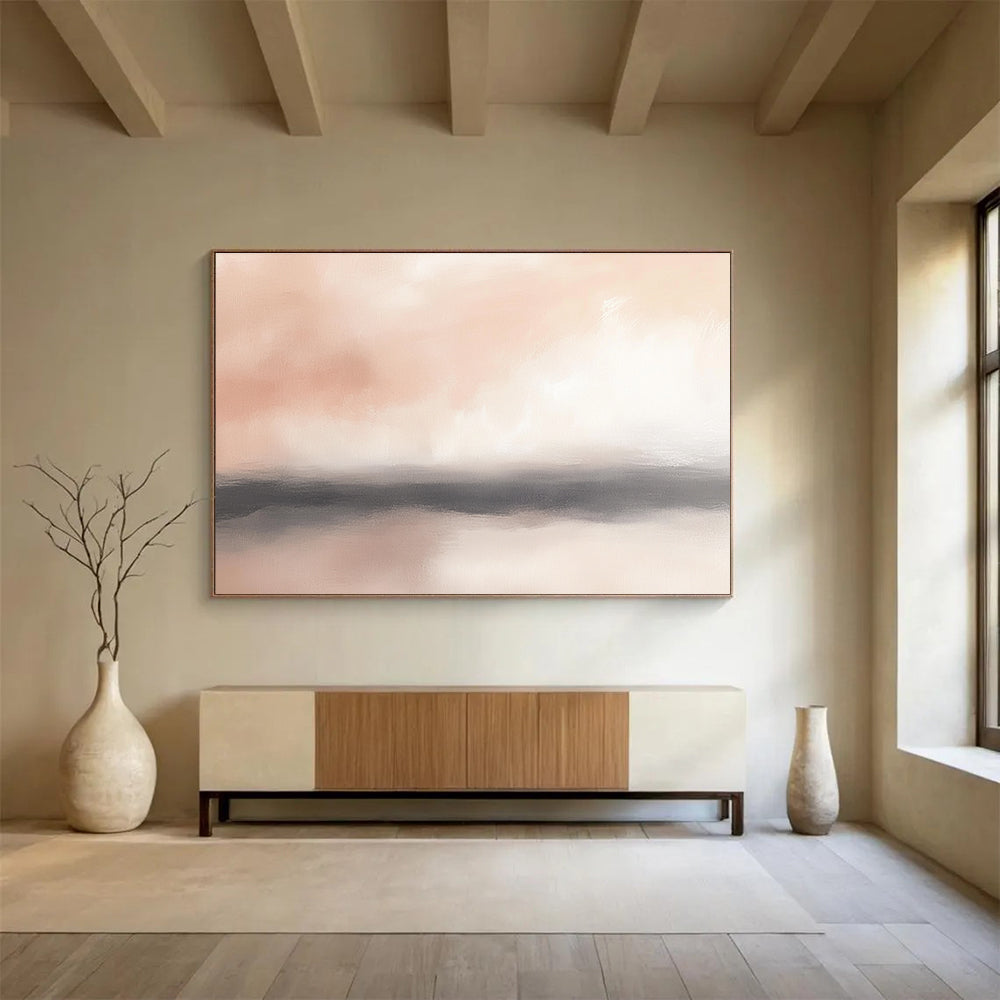 Large abstract painting of the horizon featuring soft pinks whites and hints of gray with blurry clouds for a serene atmosphere.SC360