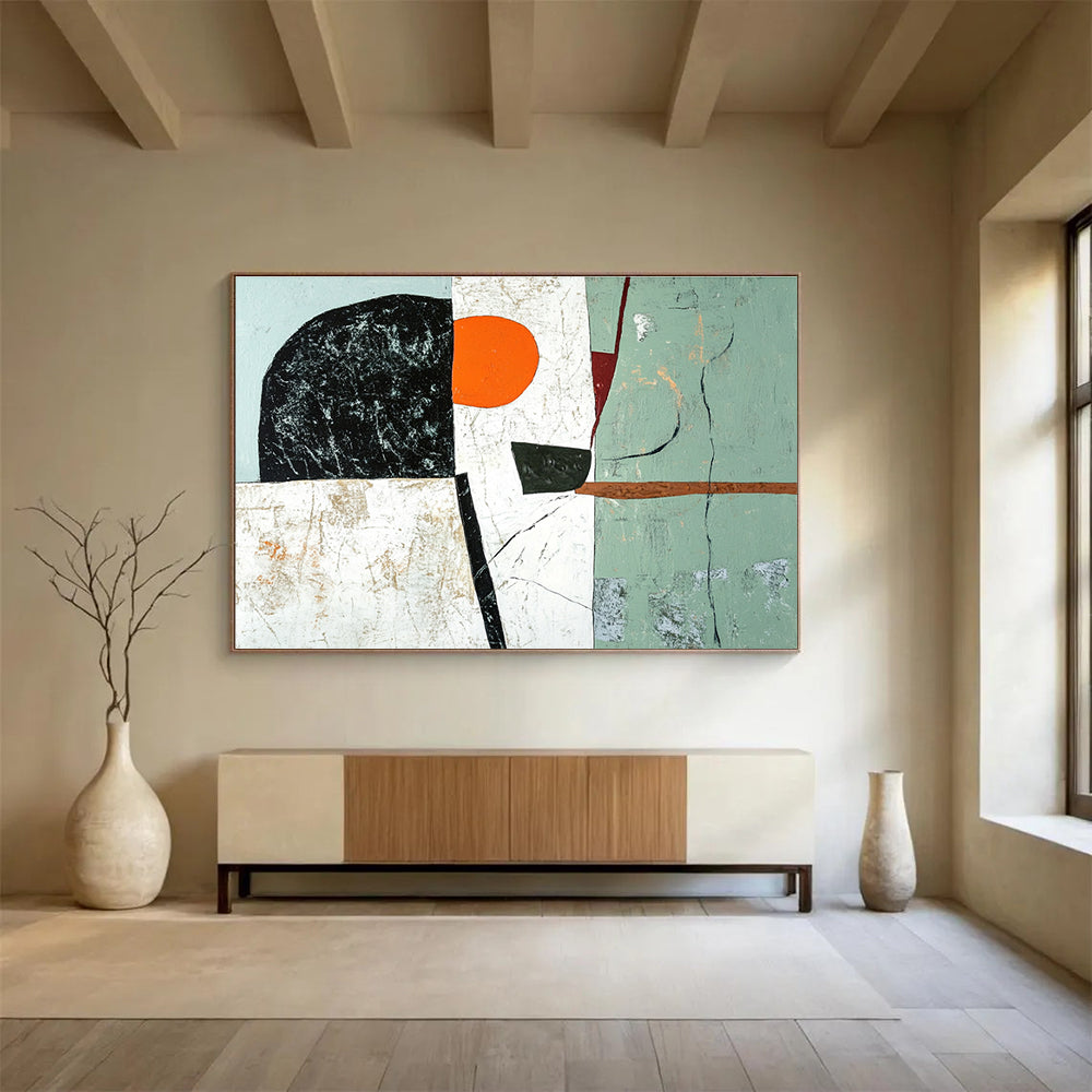 Large abstract painting featuring green black and white shapes with an orange accent and a brown line on a light gray and pale blue background.SC192