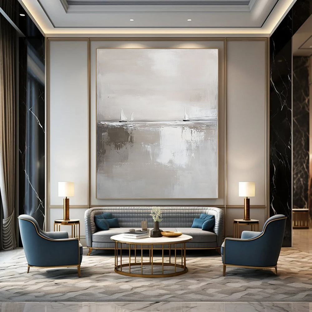 Large abstract painting in white and gray featuring calm waters and distant sailboats in a minimalist style with neutral tones.STSC359