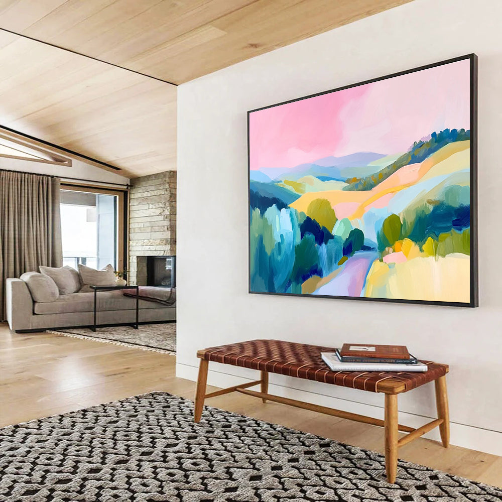 Large abstract painting of the French countryside featuring rolling hills a pink sky and vibrant blue green and yellow brush strokes.SC129