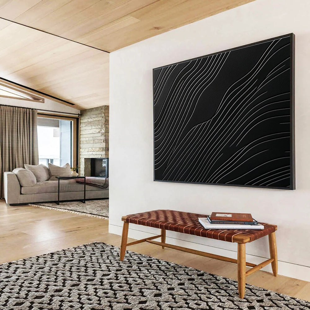 A large abstract artwork featuring elegant wave patterns on a matte black surface, showcasing layered textures and high contrast between light and dark tones.SC575