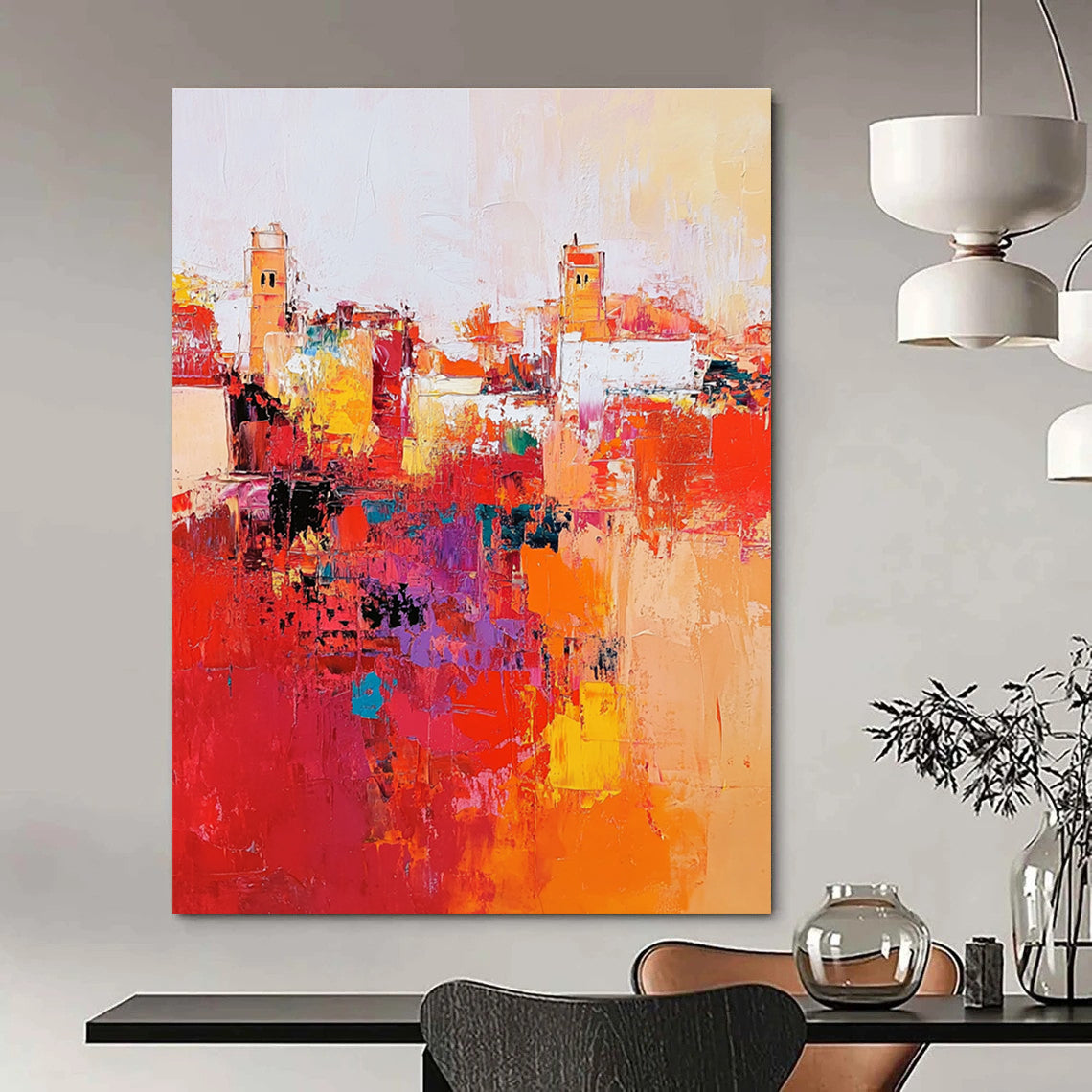 Large abstract painting depicting Marrakech cityscape with vibrant reds and oranges thick brush strokes and dynamic composition creating atmospheric lighting.STSC556