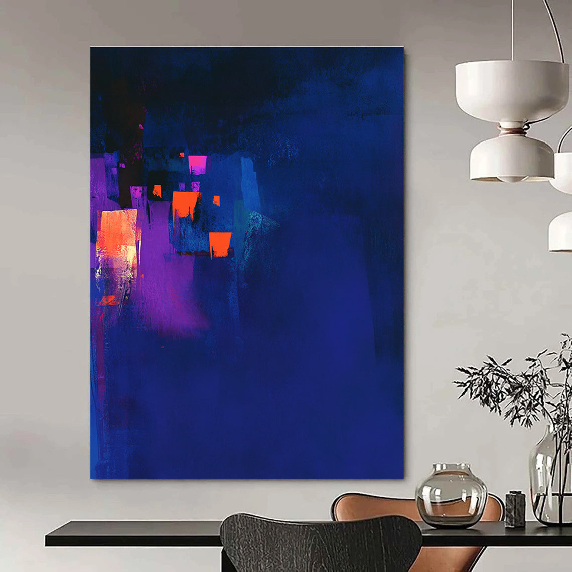 Large abstract painting in dark blue and violet with glowing orange highlights and a dark background capturing a chiaroscuro effect.STSC544