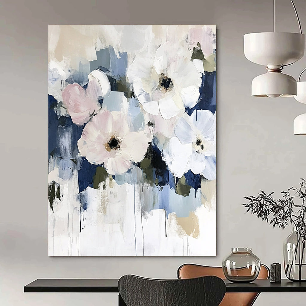 Large abstract floral painting in soft pinks and whites with hints of blue featuring minimalist style and soft brushstrokes on neutral tones.STSC056