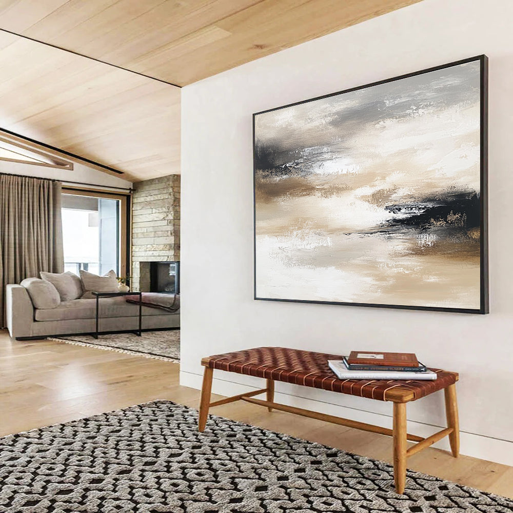 Large abstract painting in neutral tones evokes calmness with layers of soft grays browns beige whites and black creating movement and depth.SC246