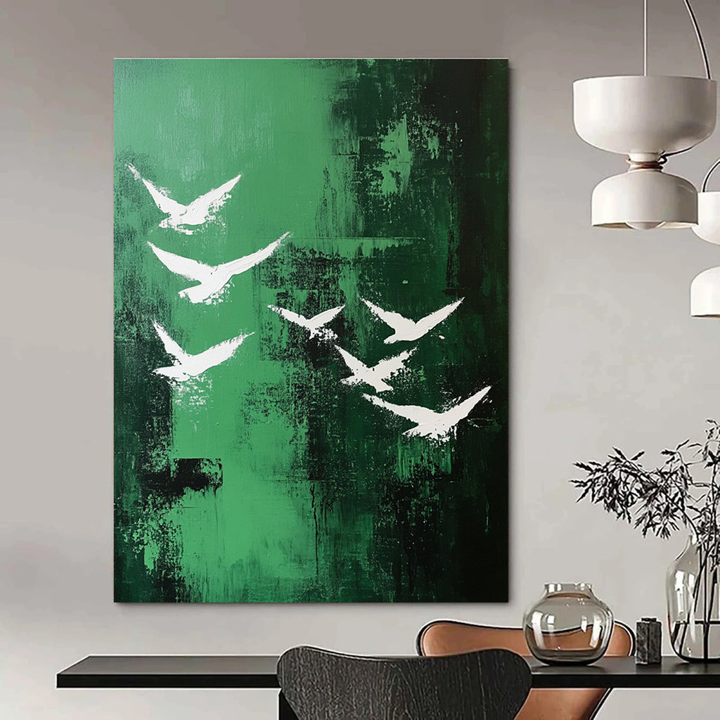 Abstract painting featuring white birds soaring over a vibrant emerald green landscape in a minimalistic style.STSC362