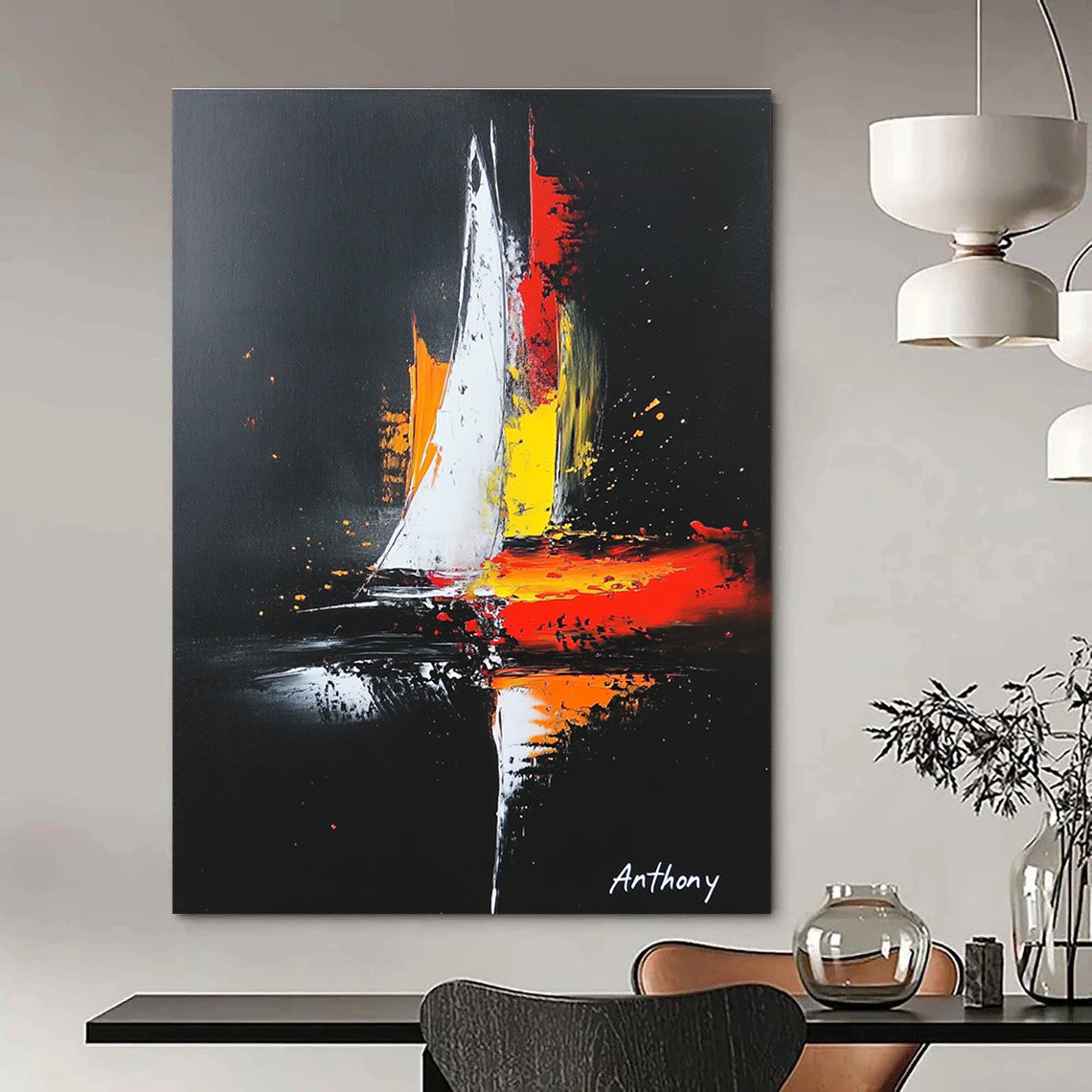 Large abstract painting featuring a sailboat on a black background with white highlights and vibrant red yellow and orange accents in a minimalistic style.STSC815
