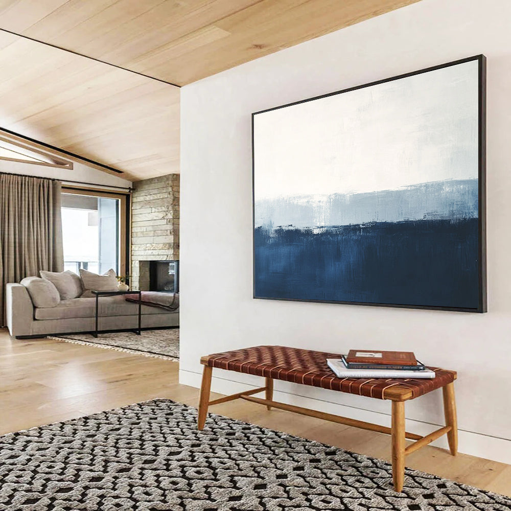 Large abstract painting in calming blue and white with subtle textures tranquil sea view soft edges and atmospheric skies.SC027