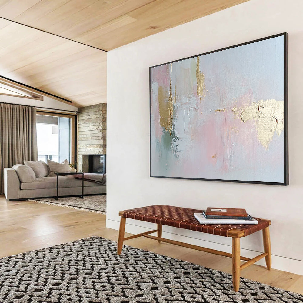 Abstract painting in soft pastel pink and pale gold with delicate brush strokes and textured elegance, enhancing a serene romantic atmosphere.SC386