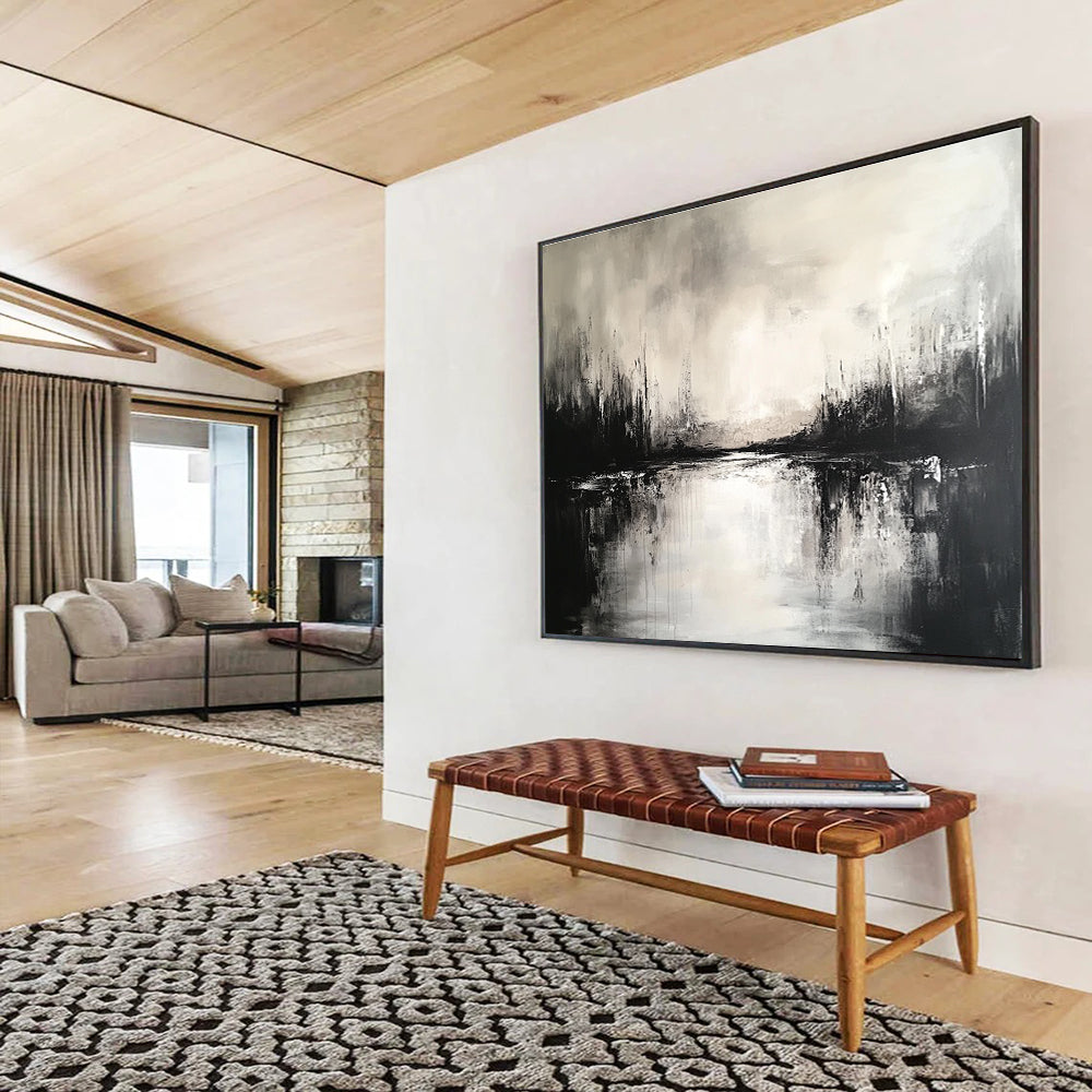 Large abstract painting featuring a black and white landscape with a serene lake and soft reflections, creating an atmospheric ambiance.SC011