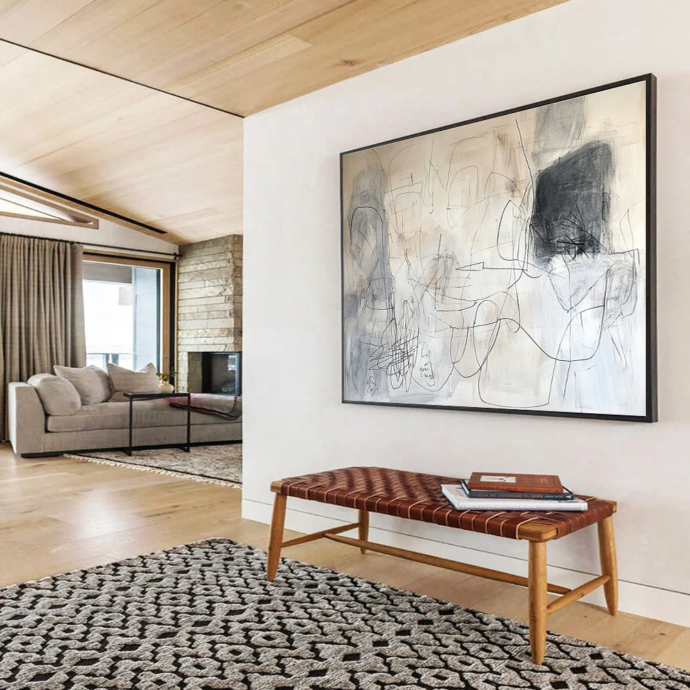 An abstract painting in white and gray tones, featuring dynamic lines and layered text, conveys a sense of movement and depth.SC390