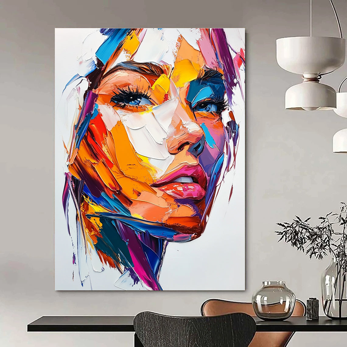 Large abstract painting of a woman's face featuring vibrant colors bold brush strokes and intense emotion on a white background.STSC457