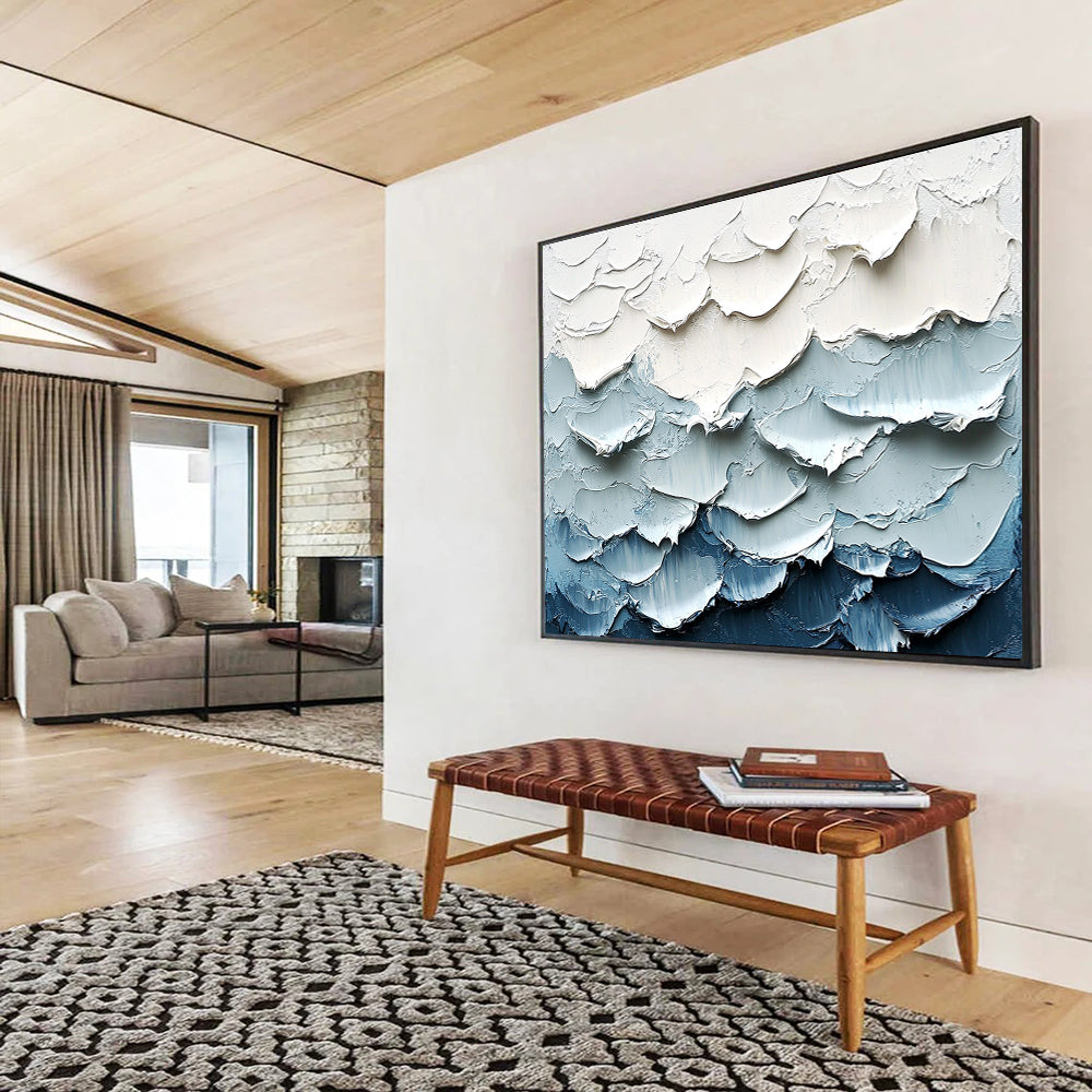 Large abstract painting of waves featuring a white and blue color palette with thick impasto texture for a striking visual effect.SC205