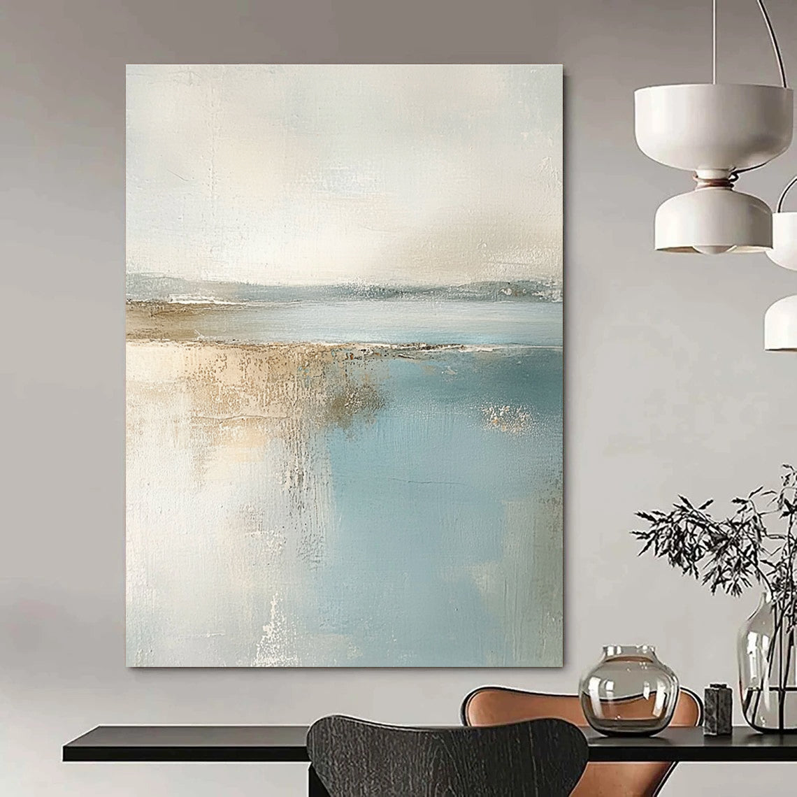Large abstract painting featuring muted pastel colors of beige and light blue creating a calming beach landscape in neutral tones.STSC017