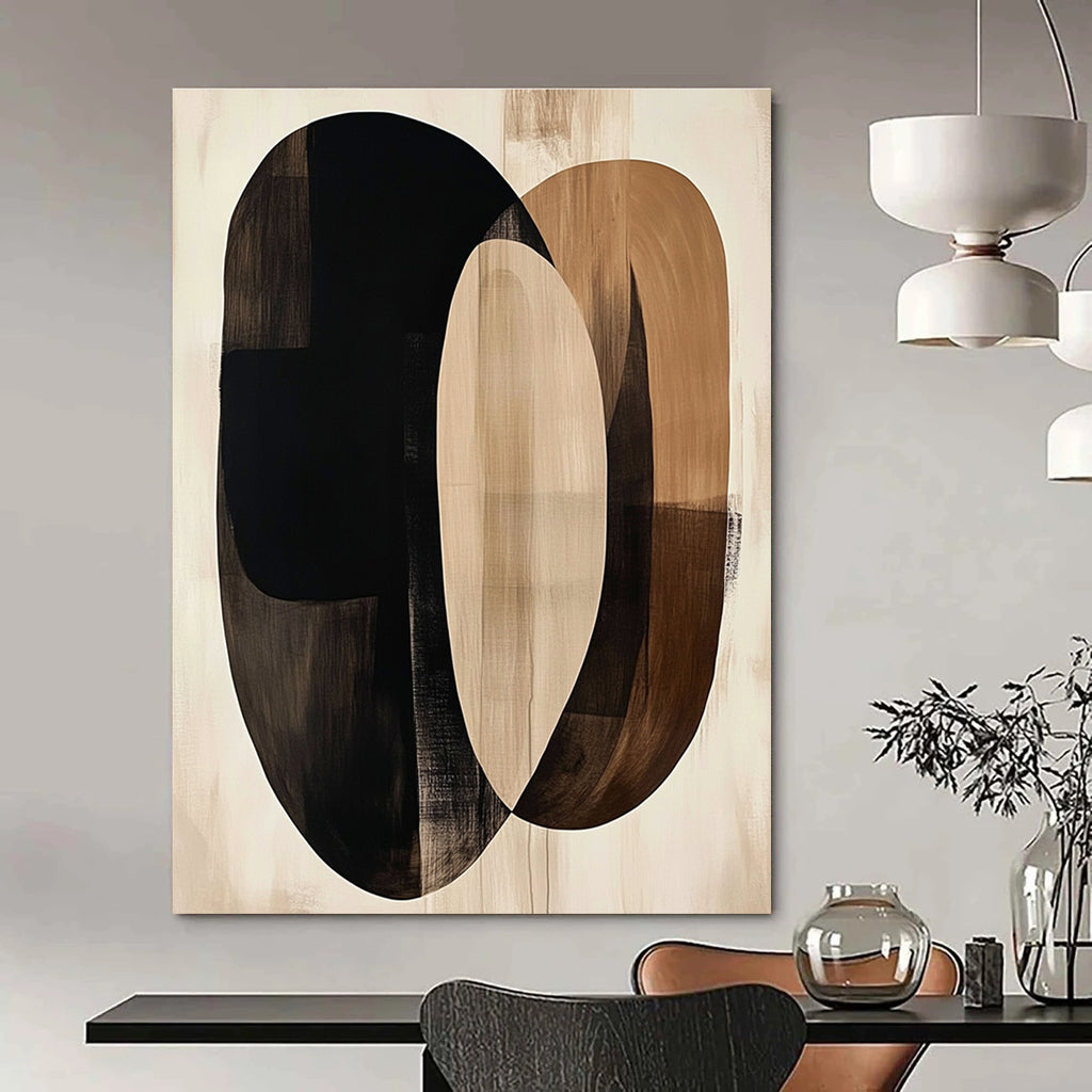 Large abstract artwork featuring fluid beige and black shapes with dark brown ovals on a cream background evokes tranquility through minimalist design.STSC470