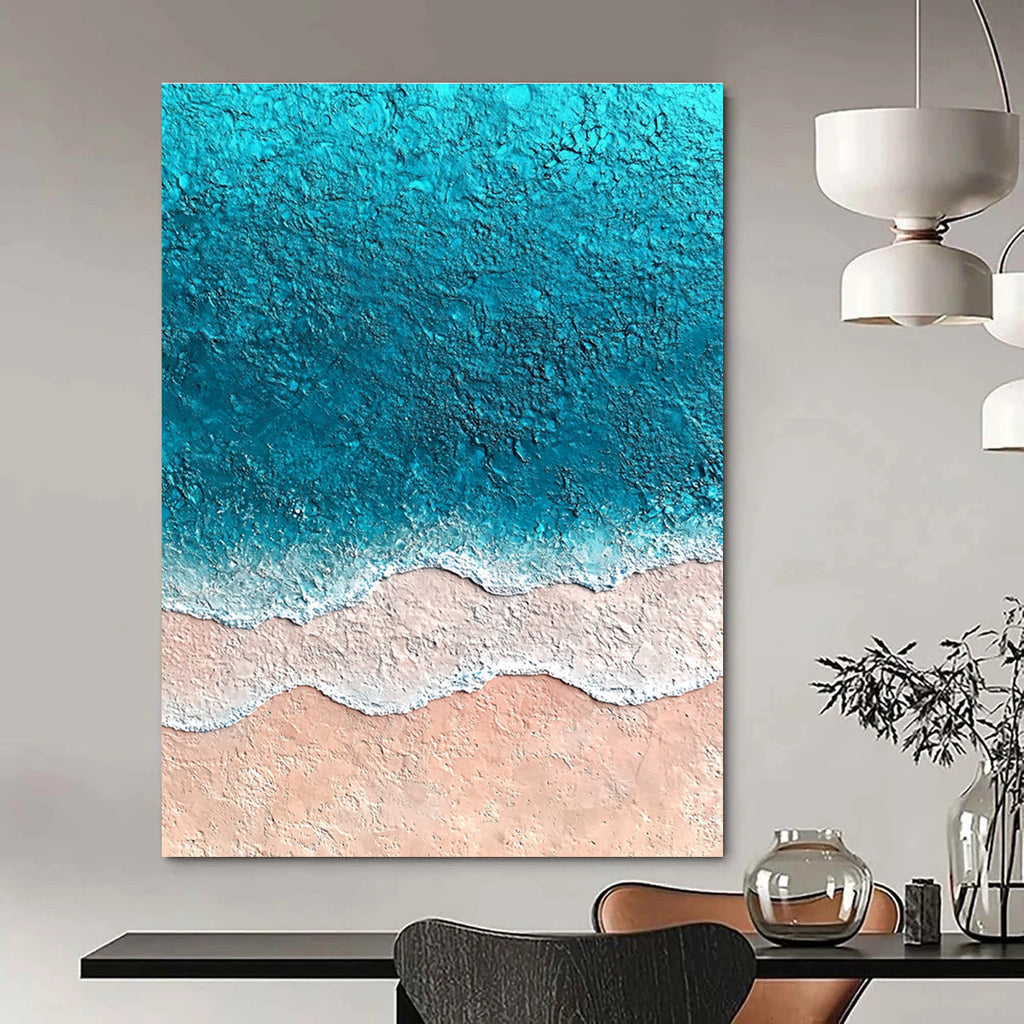 Large abstract painting featuring textured sand and vibrant blue sea with soft watercolor gradients creating an immersive oceanic experience.STSC1428