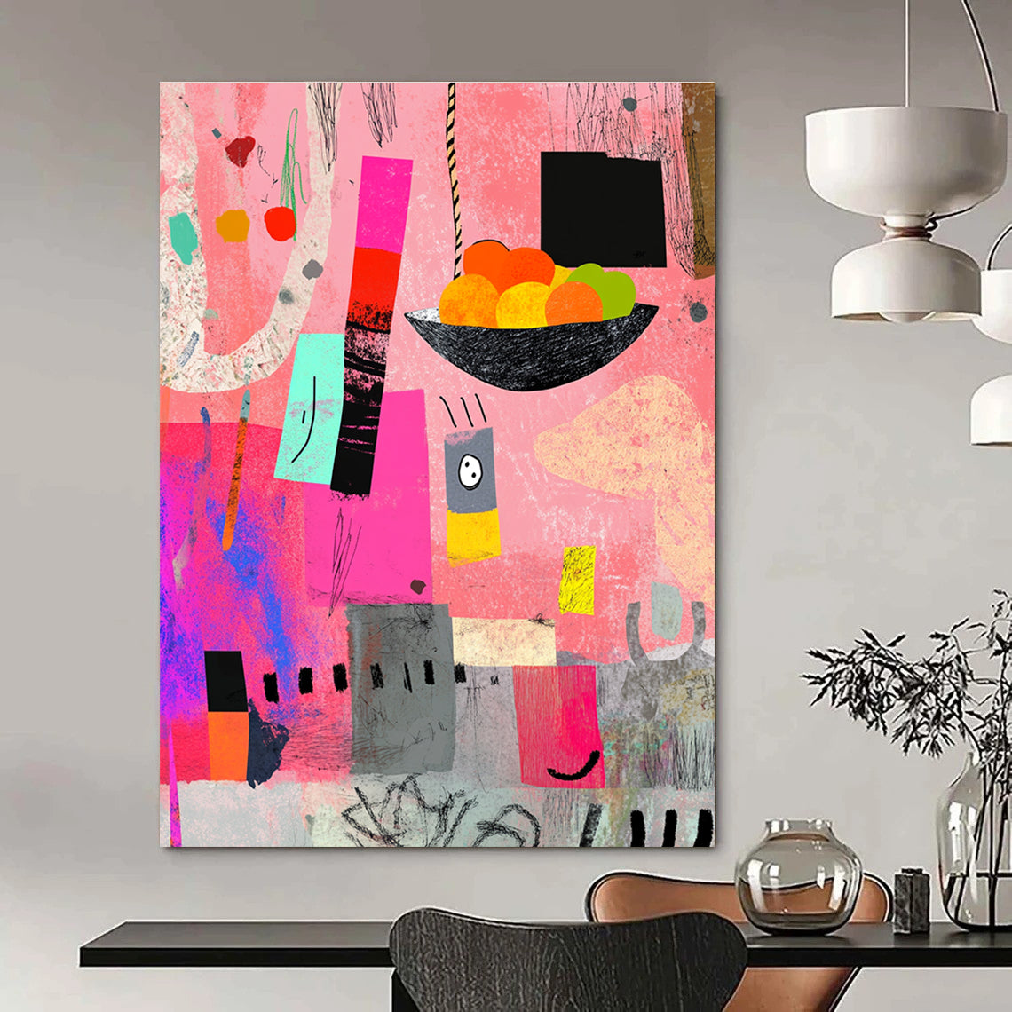 A large abstract painting featuring pink gray and black shapes with a bowl of fruits colorful scribbles and artistic texture elements.STSC969