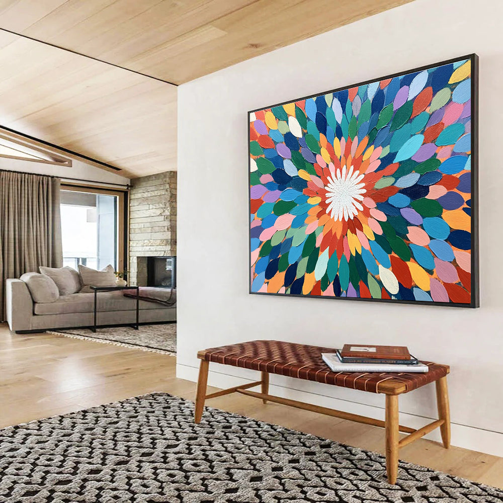 A large abstract painting featuring colorful overlapping petals in shades of green, blue, pink, orange, yellow, and purple with a vibrant center.SC526