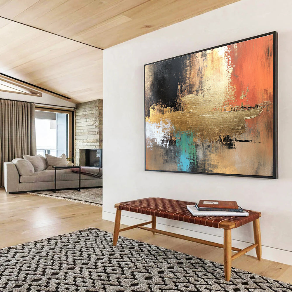 Large abstract canvas painting in golden copper and brown tones with vibrant blue green red black accents featuring white elements and light gold foil details.SC091