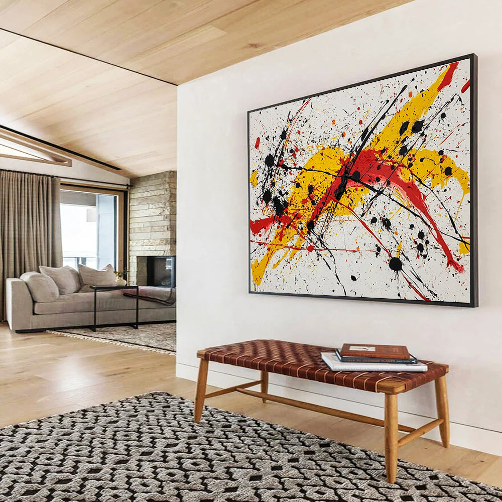 Large abstract painting featuring vibrant red yellow and black splashes evoking energy and freedom through dynamic brushstrokes and harmonious chaos.SC570