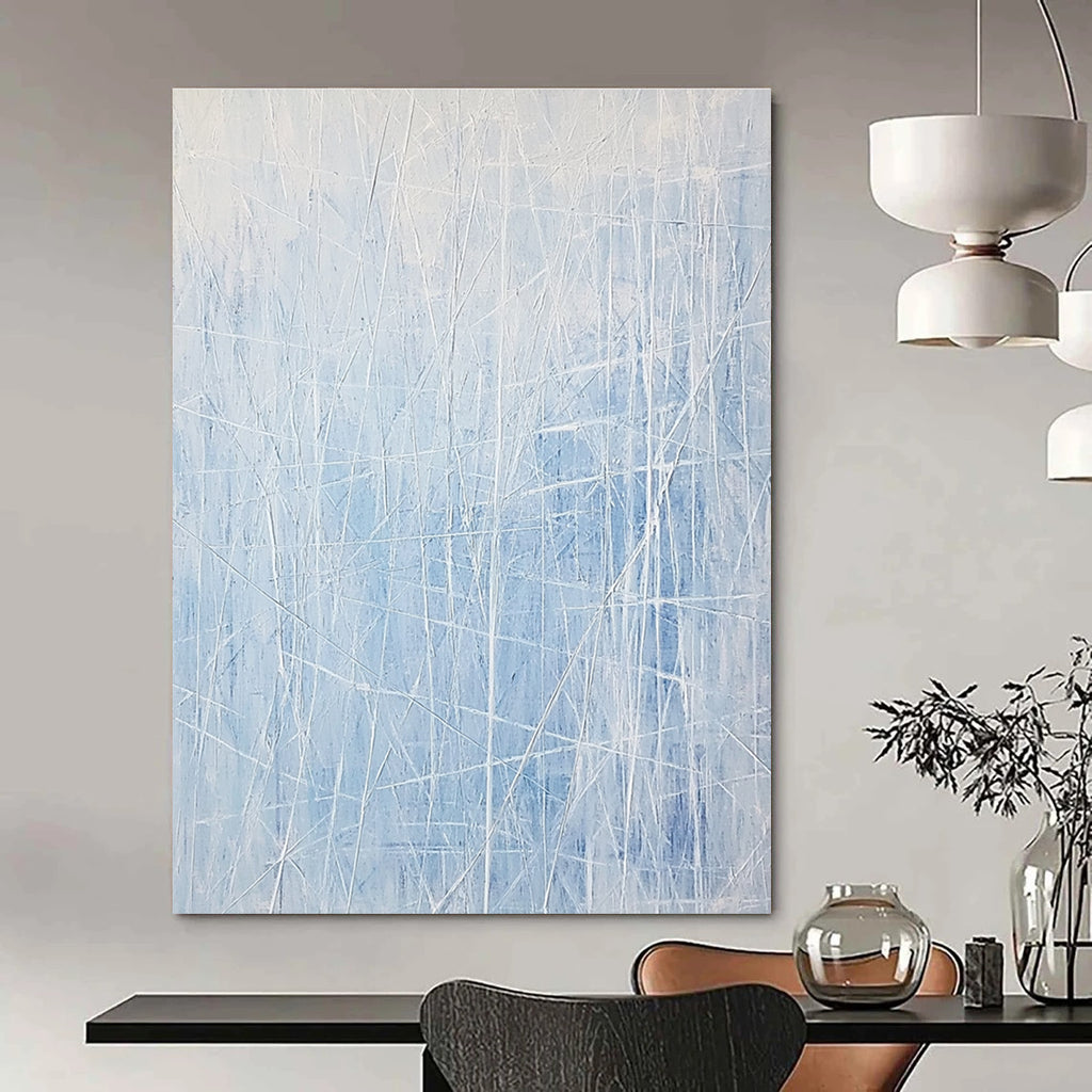 Large abstract painting featuring light blue and white lines resembling an icy landscape with vertical lines and scattered ice formations.STSC317