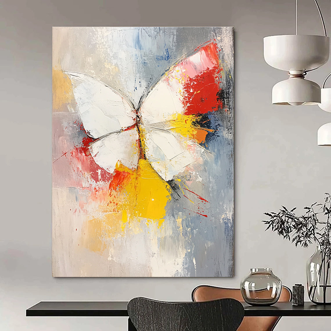 Large abstract painting featuring a white and red butterfly with vibrant yellow feathers set against a soft gray and pink background.STSC552