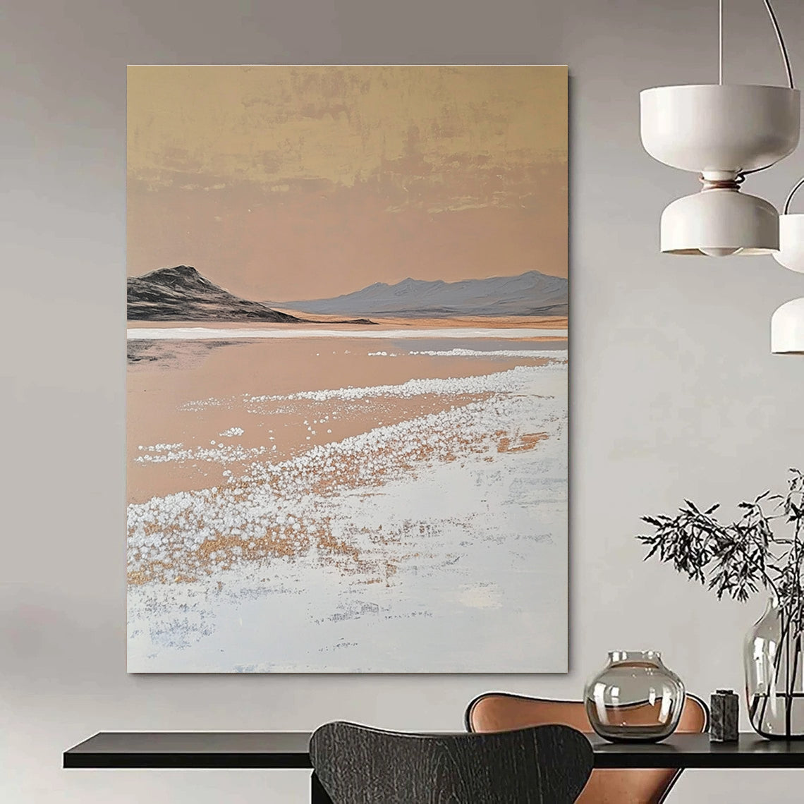 A large abstract painting features white salt crystals on a lake contrasting with textured brushstrokes in light beige and dark gold against a minimalist landscape.STSC1435