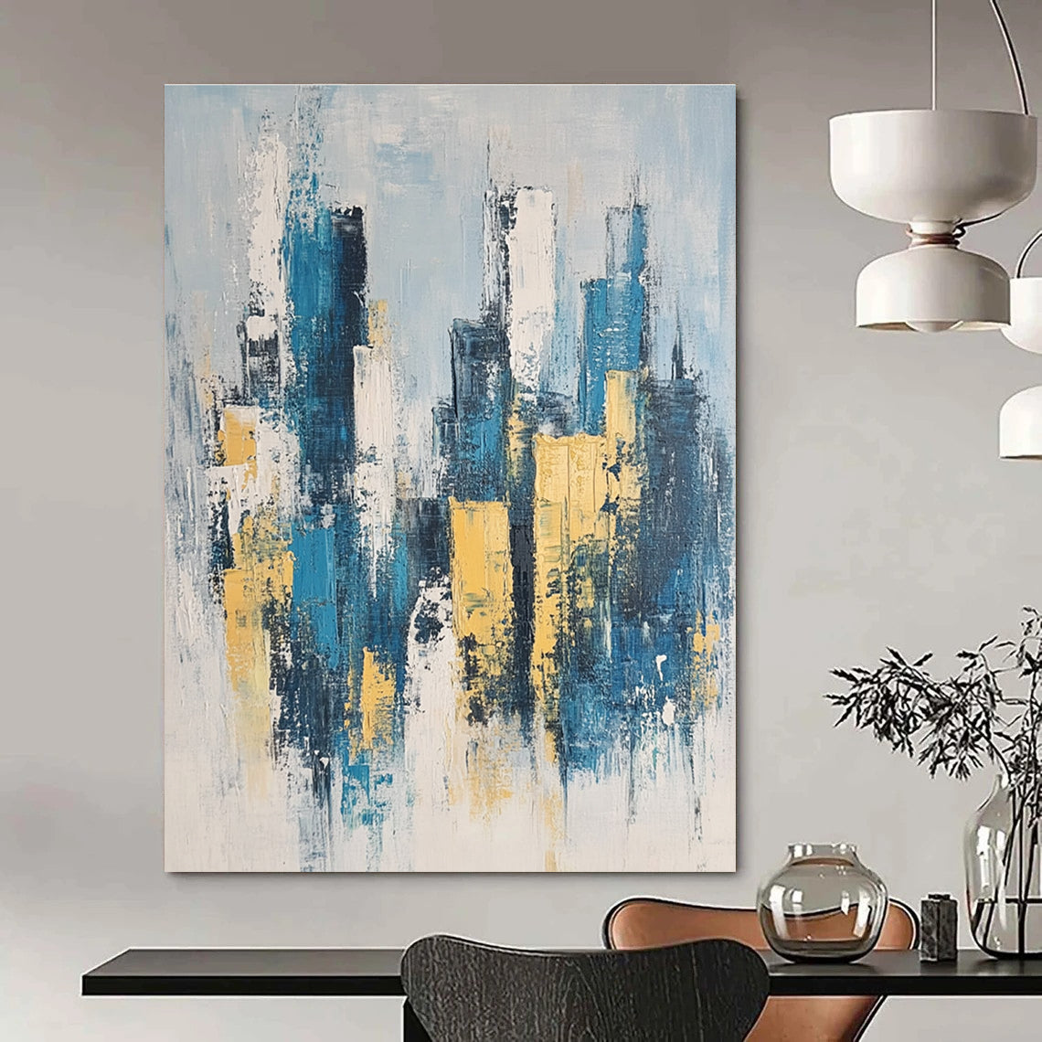 Large abstract painting featuring a modern cityscape in neutral blue and gray tones with yellow accents inspired by impressionist style.STSC1358