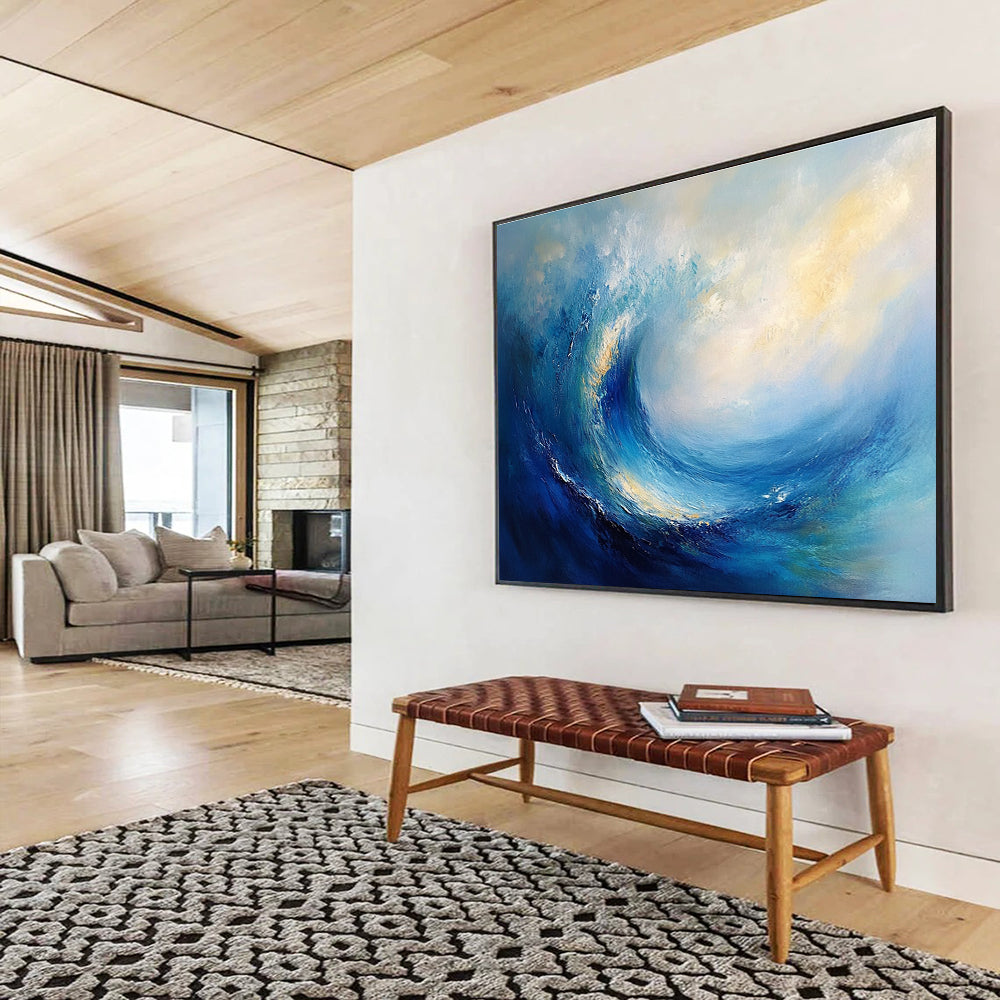 Large abstract oil painting of an ocean wave featuring blue and teal colors with thick brush strokes and white clouds in the background.SC108