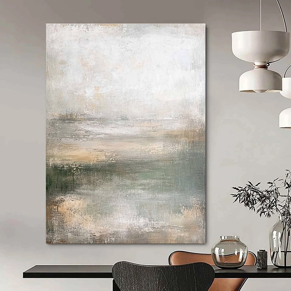 Large abstract painting in muted greens soft grays and beiges featuring a textured canvas and soft edges in neutral tones.STSC219