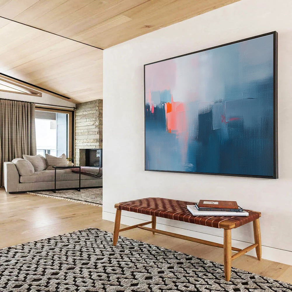 Large abstract oil painting depicting a misty rain with blue and grey hues highlighted by pink and orange accents.SC319