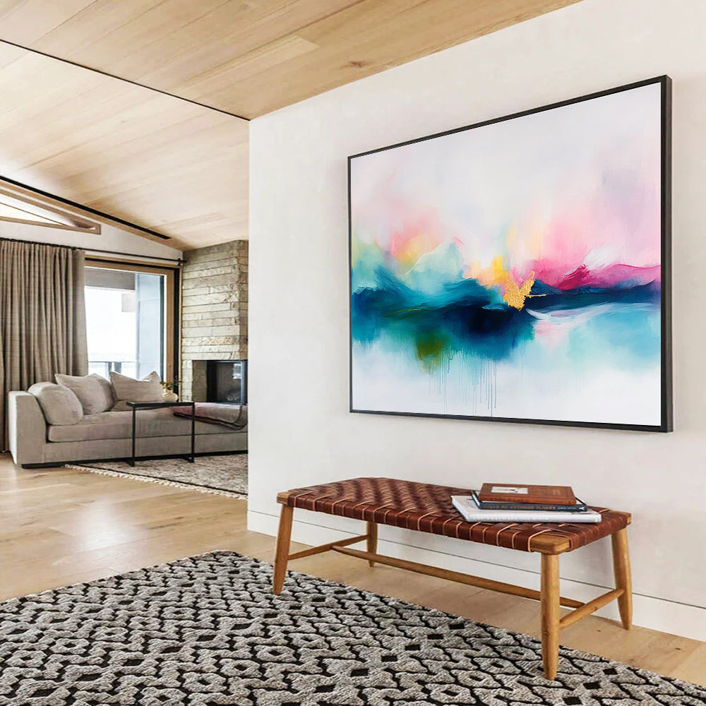 A large abstract painting featuring soft pastel colors in pinks and blues with delicate gold accents on a serene white background.SC383